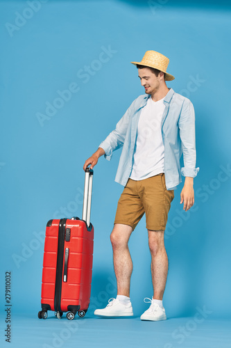 young man with suitcase