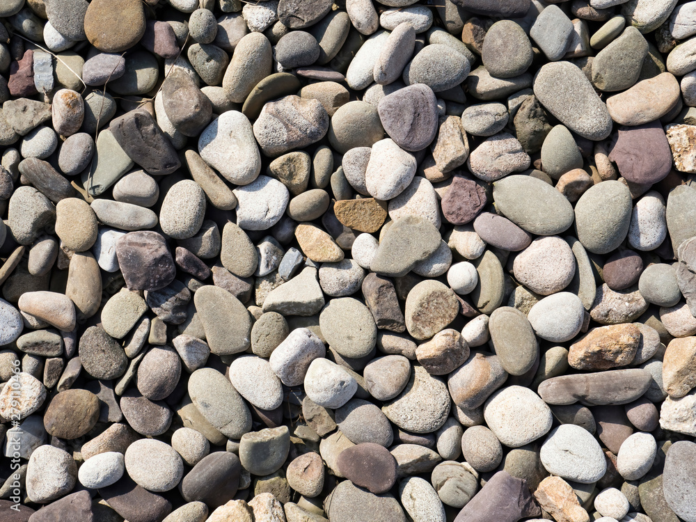 Pebbles stone texture and background. Abstract background made with stones. Pebbles stone texture and background. Abstract background made with stones.