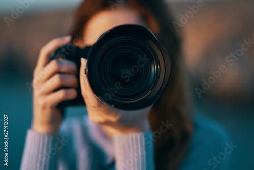 young female photographer with camera © SHOTPRIME STUDIO