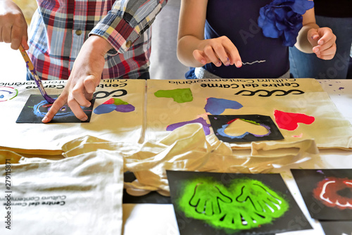 Valencia, Spain: 05.18.2019; The children are in the process of serigraphy