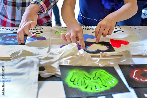 Valencia, Spain: 05.18.2019; The application of serigraphy method in child workshop