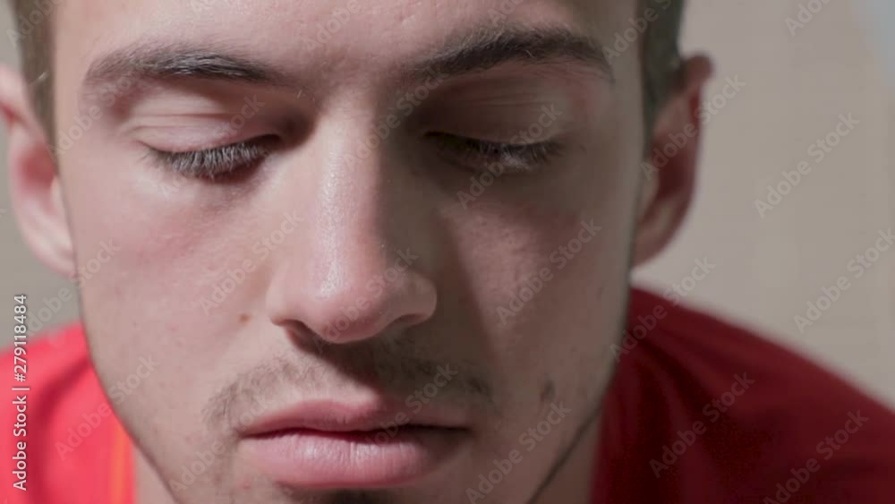 Close up of man staring in front of him looking concerned Close up of man staring in front of him looking concerned