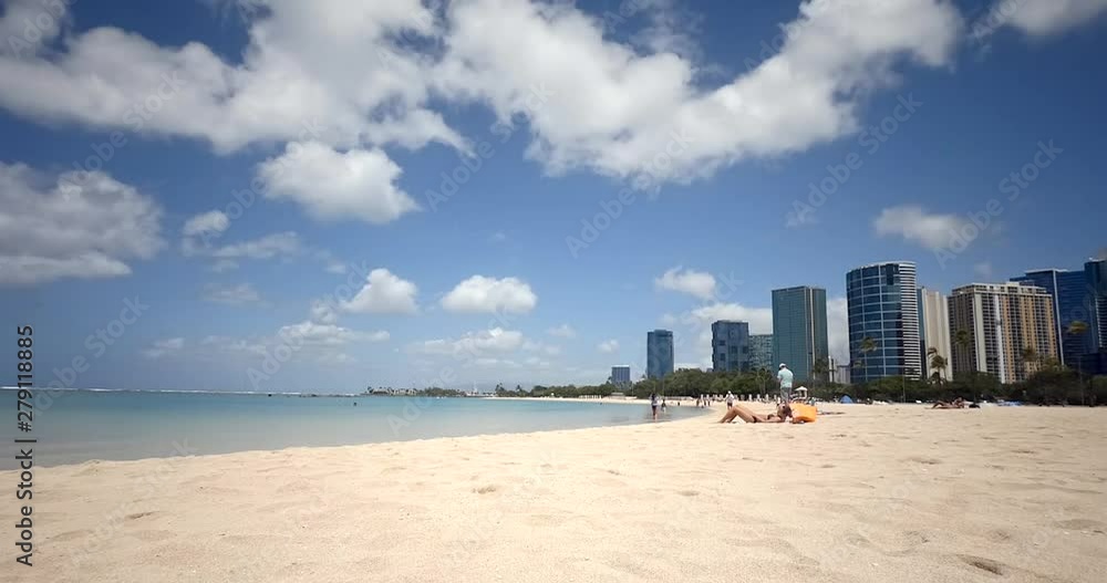 Timelapse of wWite Sandy Beach with Clouds Passing By. Located at Ala Moana Beach the Magic Island Lagoon. Timelapse of wWite Sandy Beach with Clouds Passing By. Located at Ala Moana Beach the Magic Island Lagoon.