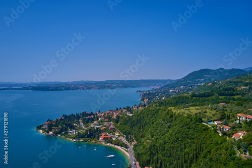 Aerial photography with drone. Italian town Toscolano Maderno on Lake Garda.