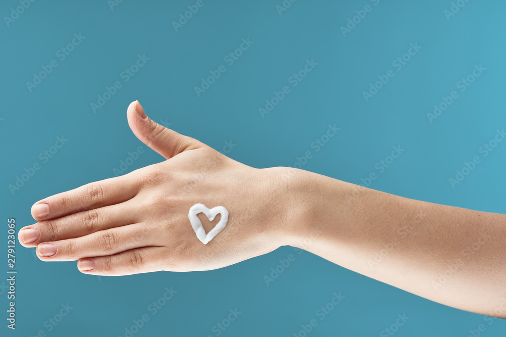 hand on blue background