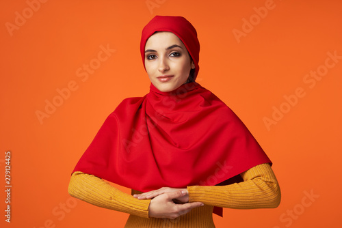 portrait of young woman in red dress © SHOTPRIME STUDIO