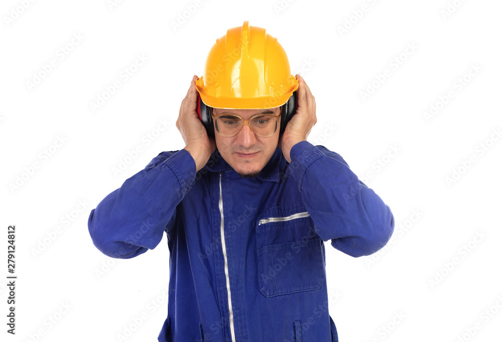 Worker covering his ears with yellow helmet Worker covering his ears with yellow helmet