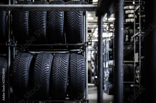 Tyres being stored in a garage - waiting for the client to have them put on his car © lightpoet