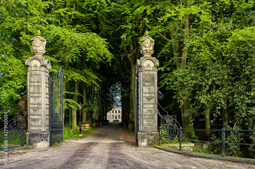 Leiden, Holland, Netherlands, May 22, 2019, The gates and road to the medievalCastle (Kasteel) Oud Poelgeest, 1668 in Oegstgeest, the former home of the Dutch scientist Herman Boerhaave (1668-1738) photo