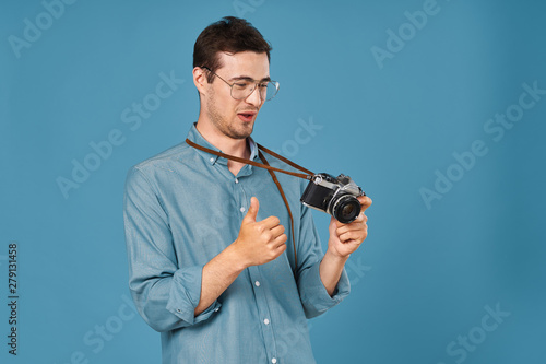 young man with a camera