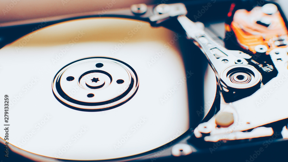 Computer engineering technology. Closeup of open disassembled hdd. PC, laptop component.