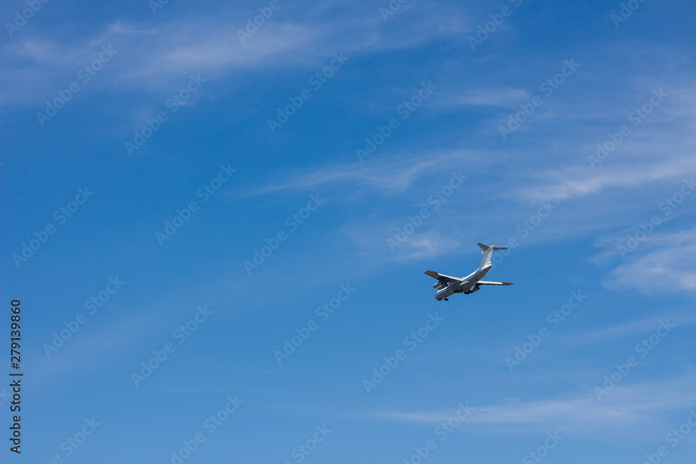 Fototapeta premium the plane flies in the sky