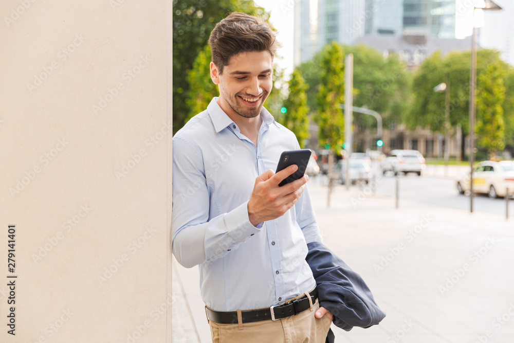Handsome young businessman smartly dressed Handsome young businessman smartly dressed