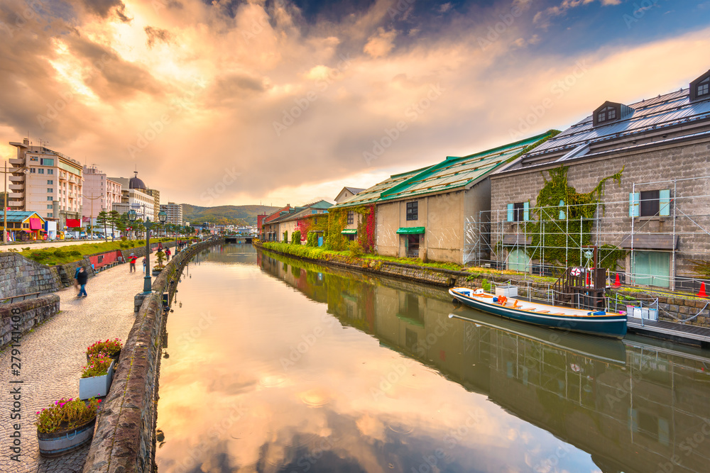 Historic Otaru Canals in Otaru, Hokkaido Prefecture, Japan at twilight.