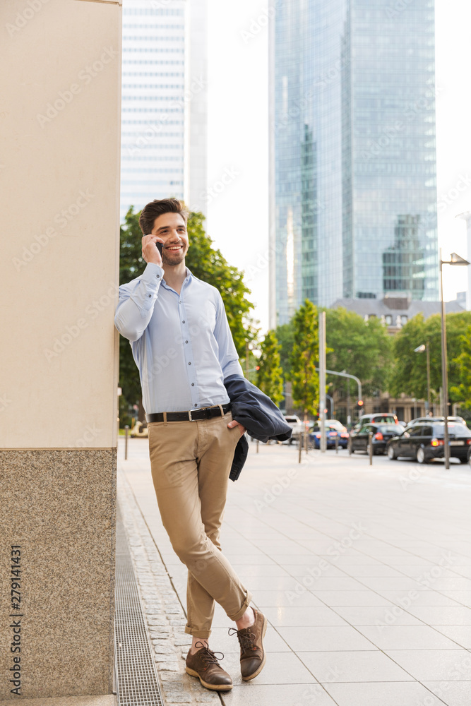 Handsome young businessman smartly dressed