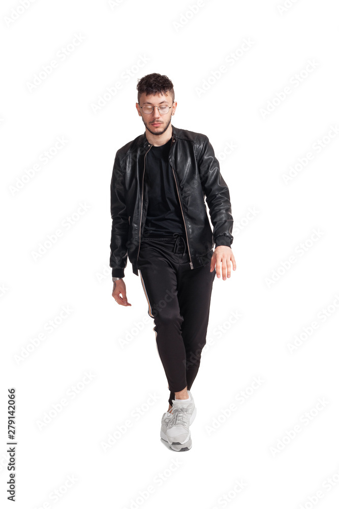 Full-length photo of a funny guy dancing in studio isolated on white background. Full-length photo of a funny guy dancing in studio isolated on white background.