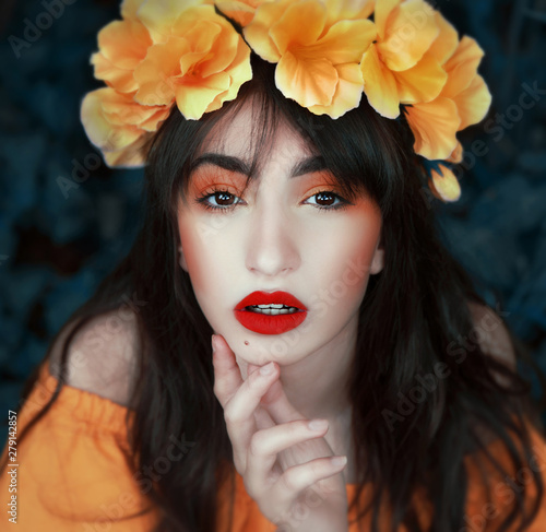 Beautiful woman with flower crown outdoors