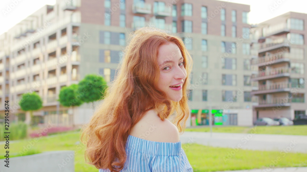 Red-haired lady. Emotion. Smile Medium shot Red-haired lady. Emotion. Smile Medium shot