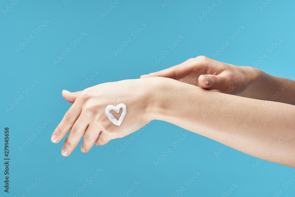 hands on blue background