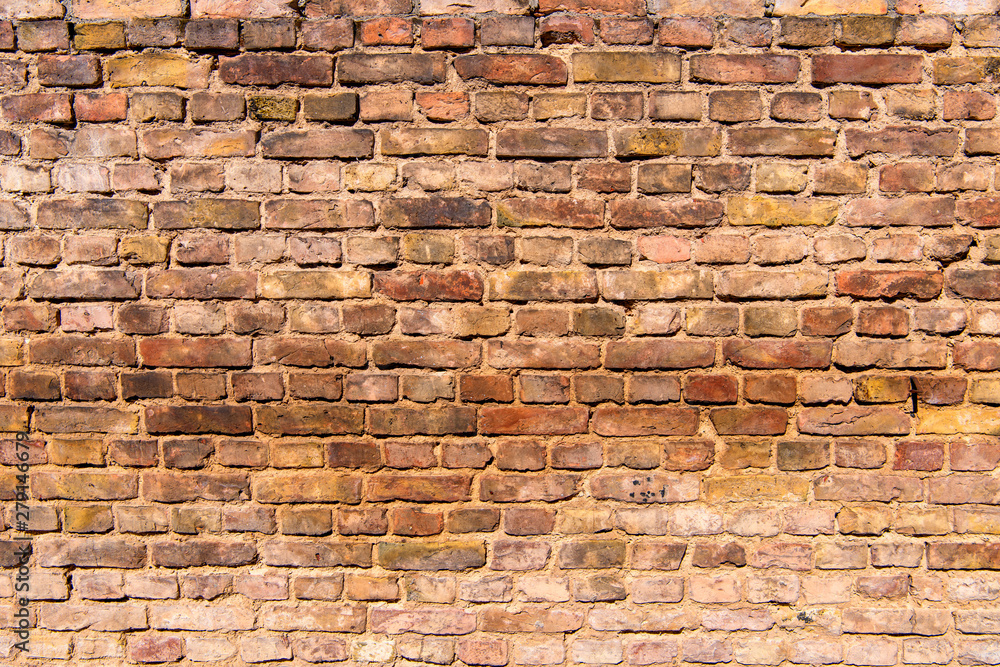 Obraz premium Wall with weathered old bricks