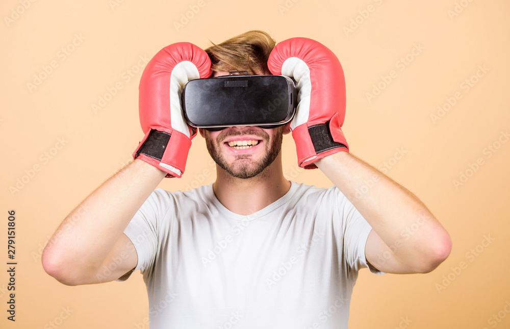 Sport. man use new technology. vr boxing. future innovation. modern gadget. Training boxing game. boxing in virtual reality. Digital sport success. man in VR glasses. Futuristic gaming Sport. man use new technology. vr boxing. future innovation. modern gadget. Training boxing game. boxing in virtual reality. Digital sport success. man in VR glasses. Futuristic gaming