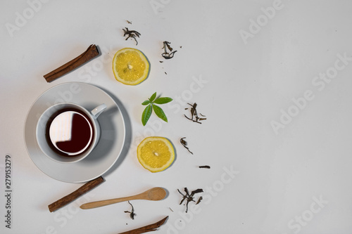 Black tea with lemon and cinnamon. © expressiovisual