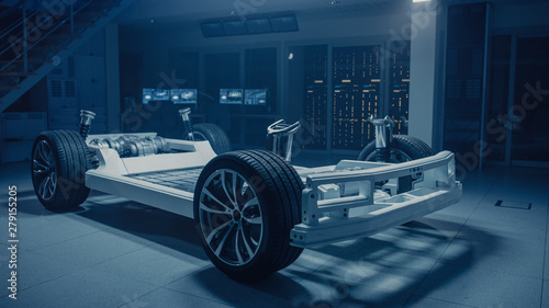 Slika na platnu Concept of Authentic Electric Car Platform Chassis Prototype Standing in Industrial Machinery Design Laboratory