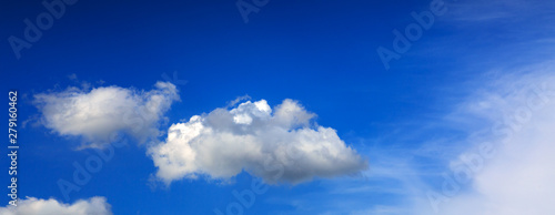 Clouds and blue sky background with copy space. © Swetlana Wall
