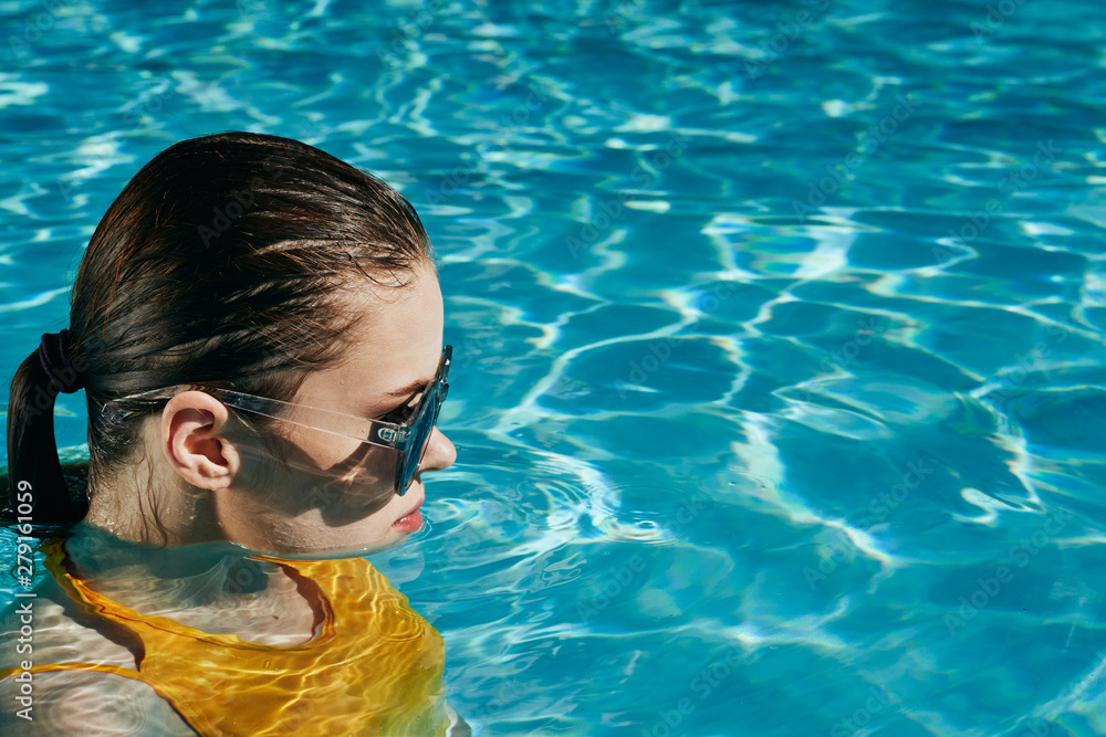 young girl in swimming pool
