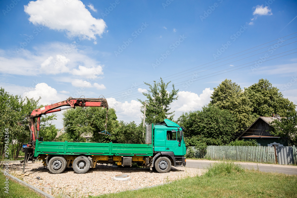 Fototapeta premium truck with mounted crane