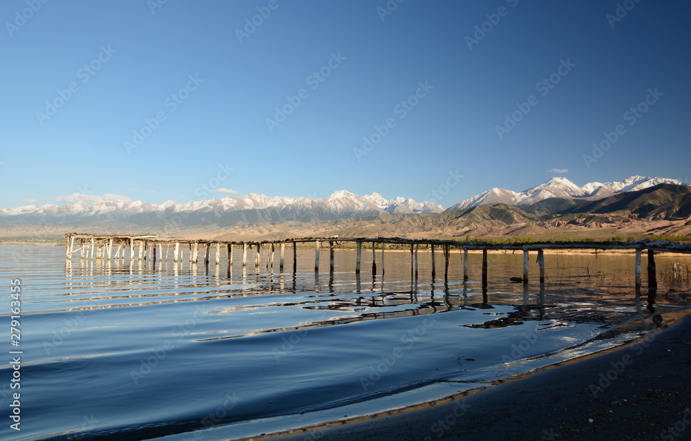 Wooden pier on Issyk-Kul lake. Kyrgyzstan