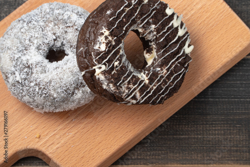 Black chocolate donut And white coconut donut