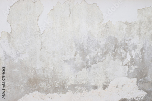 Grey old wall plaster cement plaster surface with shabby damaged peeling dirty for background Textured