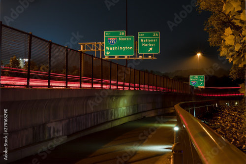 Traffic Exit Sign to National Harbor in Maryland at Night