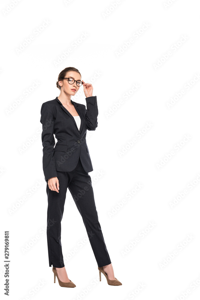 full length view of young successful businesswoman in black suit and glasses isolated on white full length view of young successful businesswoman in black suit and glasses isolated on white