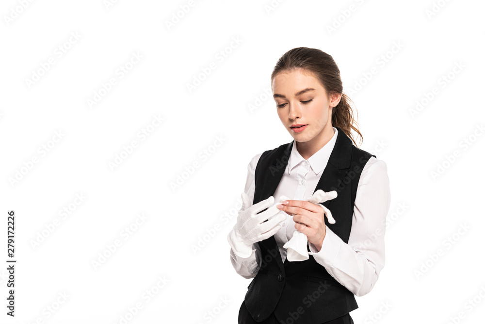 young waitress in formal wear looking at white gloves isolated on white young waitress in formal wear looking at white gloves isolated on white