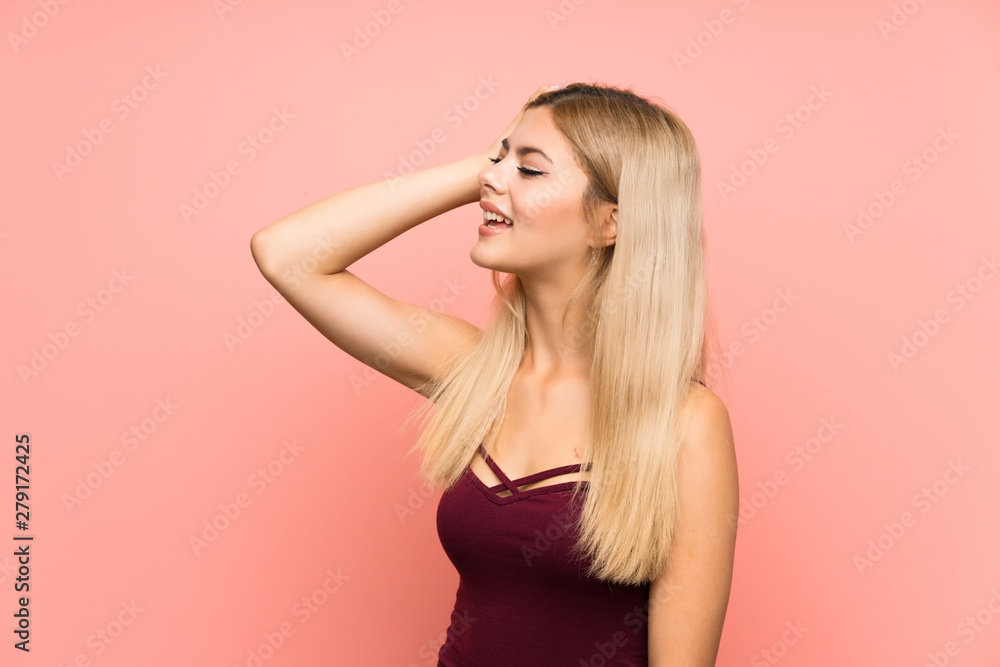 Teenager girl over isolated pink background laughing Teenager girl over isolated pink background laughing