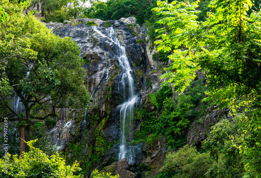 Waterfall in tropical forest at Khlong Lan National park, Kamphaeng Phet, Thailand. Waterfall in tropical forest at Khlong Lan National park, Kamphaeng Phet, Thailand.