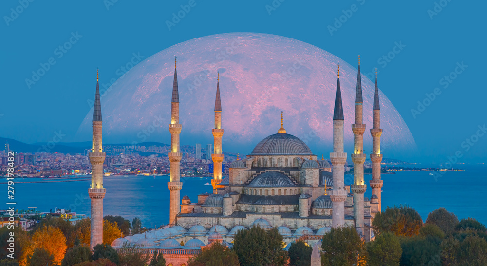 Naklejka premium The Sultanahmet Mosque (Blue Mosque) with full moon - Istanbul, Turkey 