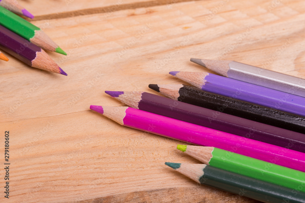 Obraz premium color pencils on wooden background