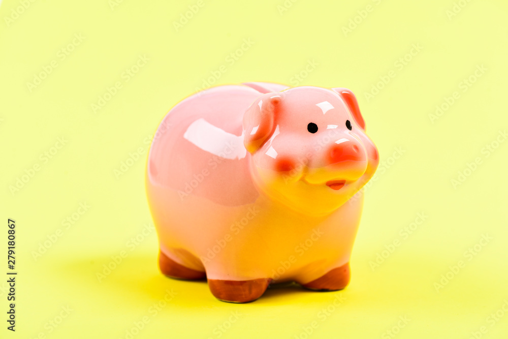 Money is a power. financial problem. money saving. piggy bank on yellow background. income management. planning budget. Piggy bank with coin. saving or accumulation of money, investment Money is a power. financial problem. money saving. piggy bank on yellow background. income management. planning budget. Piggy bank with coin. saving or accumulation of money, investment