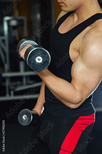 sports lifestyle, more muscular body.sports lifestyle, more muscular body. the man is engaged in fitness photo