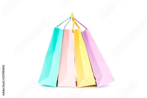 Multicolor paper bags isolated on white background