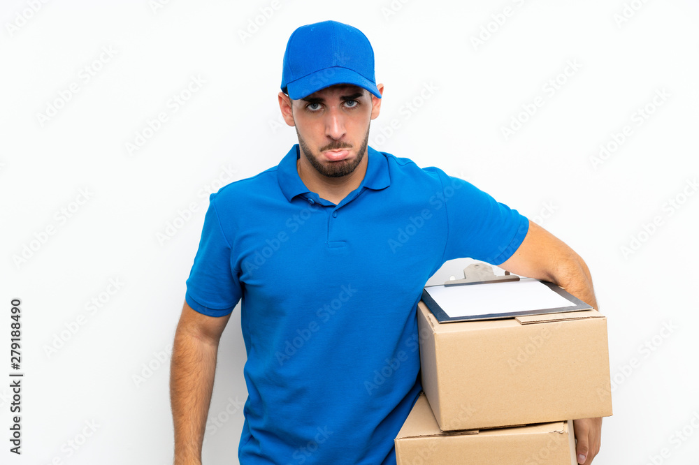 Delivery man over isolated white background sad Delivery man over isolated white background sad