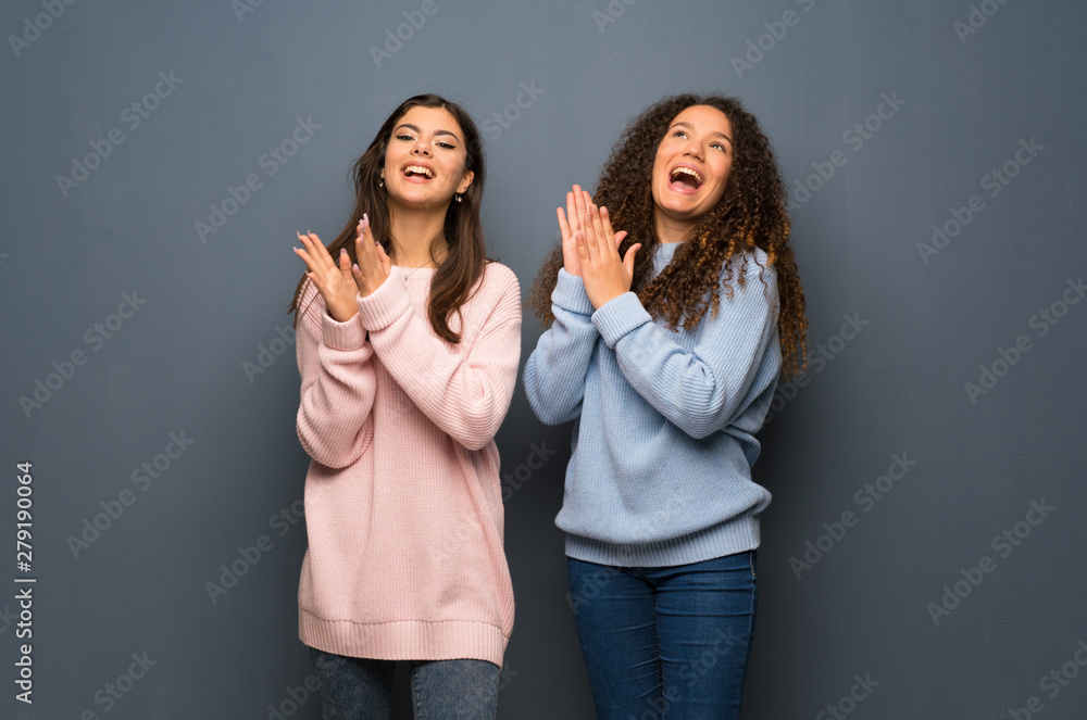 Teenager friends applauding after presentation in a conference Teenager friends applauding after presentation in a conference