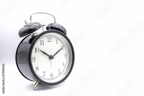 Vintage round alarm clock on white background and copy space for text.