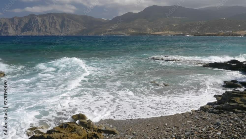 The Mediterranean Sea, waves breaking and lapping upon a beach The Mediterranean Sea, waves breaking and lapping upon a beach