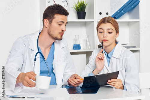 portrait of doctor and patient in office