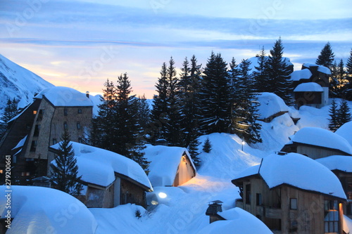 houses of Avoriaz village in France covered of snow photo