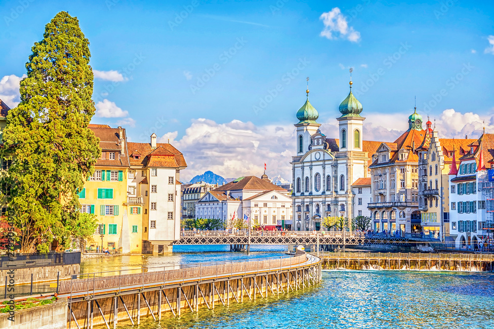Beautiful view of the the historic city center of Lucerne with Jesuit Church from river Reuss on sunny summer day, Canton of Lucerne, Switzerland